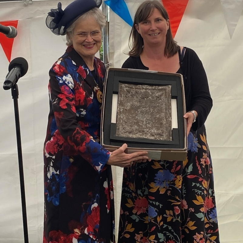 Her Excellency receiving Captain Matthew Flinders coffin plate from members of the Flinders family